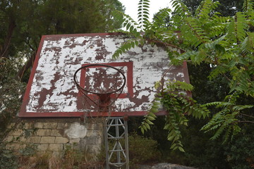 weathered abandoned basketball hoop