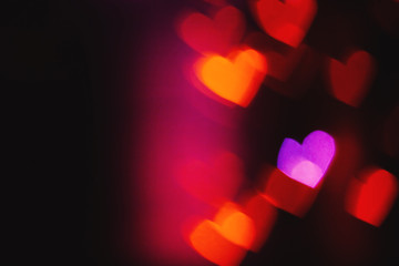 Festive overlay effect. Colorful heart bokeh festive glitter background. Christmas, New Year and Valentine's day design