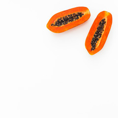Tasty papaya isolated on white background. Flat lay.