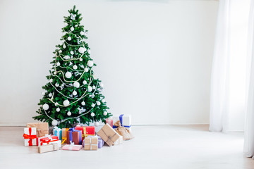 Christmas home decor with Christmas tree and gifts new year holidays