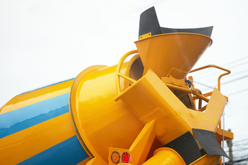 Cement truck in back upward view for resident construction concept