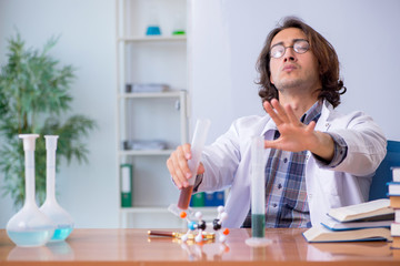Chemistry lecturer during lecture in college