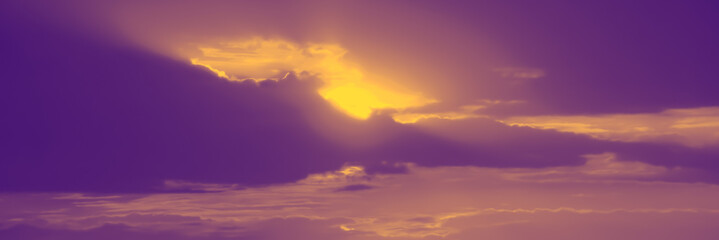 Defocused image of an sunrise in the clouds.