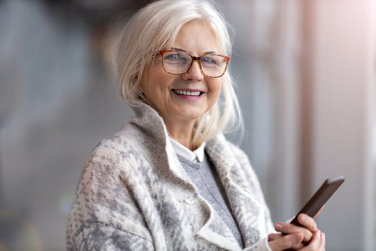 Portrait of senior woman wearing glasses