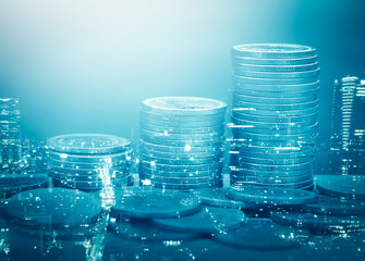 Double exposure of city and stack of coins for finance and banking concept