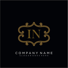 Initial letter IN logo luxury vector mark, gold color elegant classical
