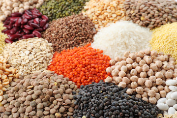 Different types of legumes and cereals as background, closeup. Organic grains - obrazy, fototapety, plakaty