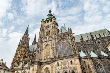 Fototapeta na wymiar St. Vitus's Cathedral in Prague Castle, Czech Republic. Low Angle View of St. Vitus Cathedral bell towers