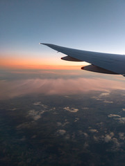 Naklejka na ściany i meble View from aeroplane seat with plane wing