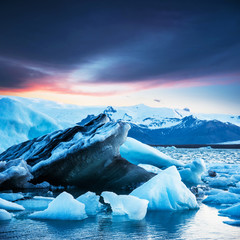 Magical beautiful landscape with ice depths in the famous Jokulsarlon glacial lagoon in Iceland at dawn. Exotic countries. Amazing places. Popular tourist atraction. (global warming – concept) © anko_ter