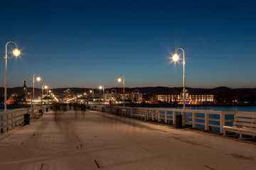 A view along a jetty on a winter evening