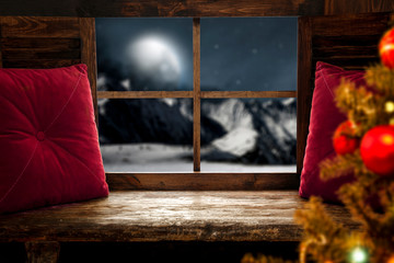 Window winter sill of free space and xmas time.Red pillows and board of free space 