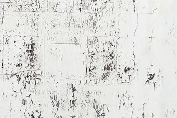 White paint pealing off a wall makes an interesting texture to use as backgrounds