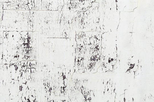 White paint pealing off a wall makes an interesting texture to use as backgrounds