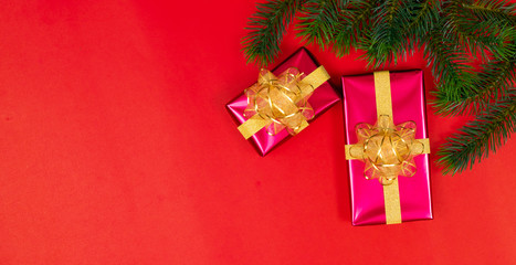 Christmas background concept. Top view of Christmas gift box gold balls with spruce branches