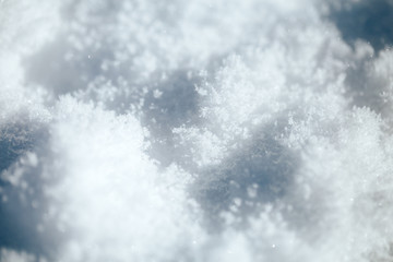 white snow texture with shadows, selected focus, macro photo.