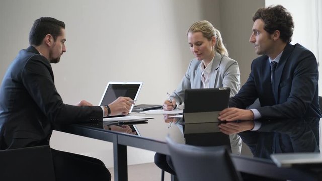 Business people presenting project to client