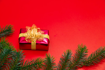 Christmas background concept. Top view of Christmas gift box gold balls with spruce branches