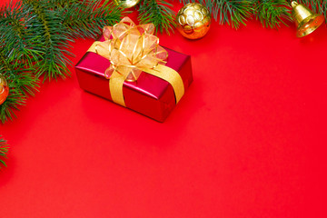 Christmas background concept. Top view of Christmas gift box gold balls with spruce branches