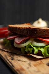 sandwich with cheese and vegetables, roast beef sandwich