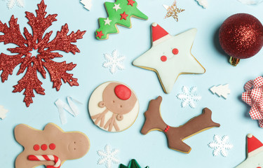 Christmas decoration. Christmas ornaments arrangement on light blue background.	