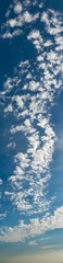 Fantastic clouds against blue sky, panorama