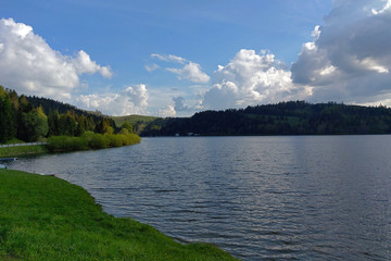 Blue lake idill under cloudline sky, nature