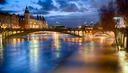 Night view of Paris flood as river Seine rises and approaches record level.