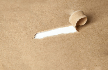 torn paper on wood color with space for text. please enter your entry.