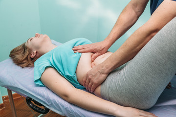 Fototapeta na wymiar osteopathic belly massage