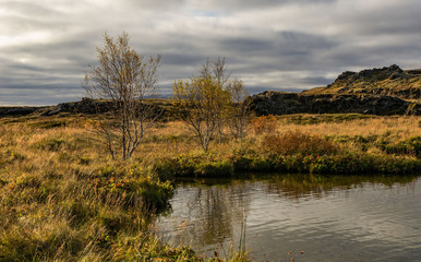 Iceland, autumn, incredible landscapes of the country, lake and rocks