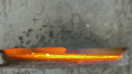 Forge workshop. Smithy manual production. Gas furnace for heating metal. Modern melting stove for...