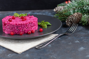 Holiday salad of beets and soft cheese. Added sesame seeds and chanok. Vegetarian food.