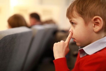 Child picks his nose