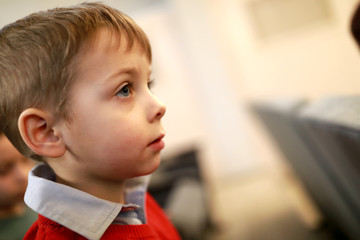 Serious child watching performance