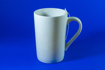 Cup of tea on a classic blue background