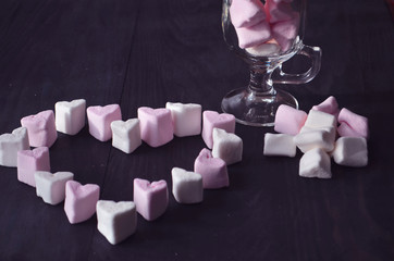Marshmallow heart over pink background. Valentine's Day or Love concept