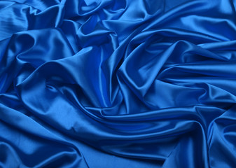 Blue color silk fabric. Abstract background.