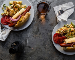 hot dogs on a homemade bun with potato salad