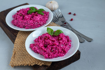 Holiday salad of beets and soft cheese. Added sesame seeds and chanok. Vegetarian food. Healthy food.