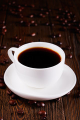 a cup of espresso on a wooden table