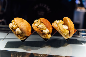 Spanish burger with omelet in the market of San Miguel