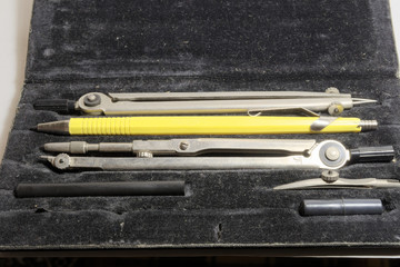 old set of drawing tools in a case
