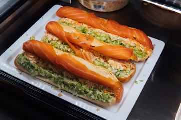 A wide variety of traditional tapas with seafood in Spain at the San Miguel market