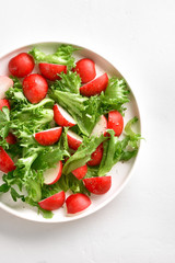Radish salad with lettuce leaves