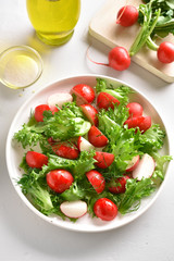 Radish salad with lettuce leaves
