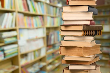 Collection stack of old retro books on background