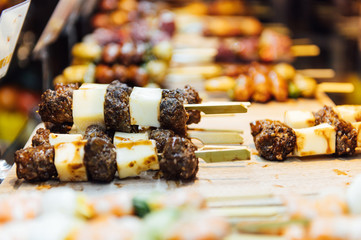 Naklejka premium A wide variety of traditional tapas with seafood in Spain at the San Miguel market