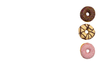 various colored delicious donuts on white background, space for text
