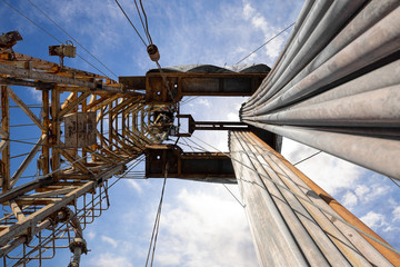 Oil and Gas Drilling Rig. Oil platform isolated on white background. Drilling rig in oil field for...